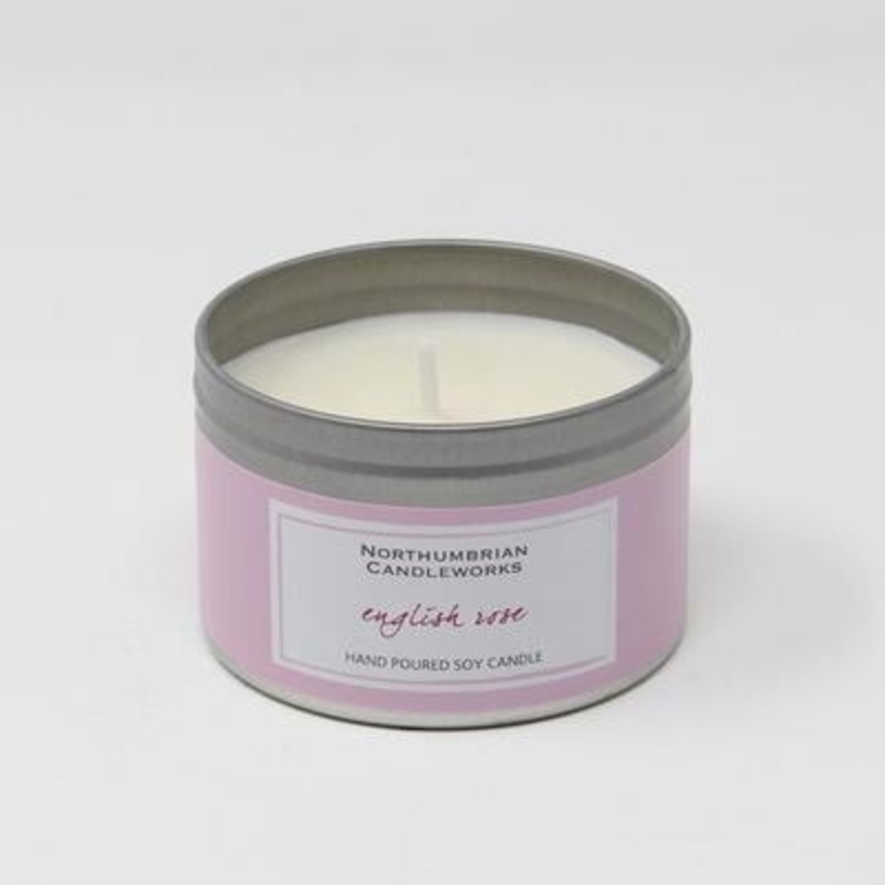 Northumbrian Candleworks English Rose Soy Candle Tin Enjoy the fresh and floral fragrance of an English Rose created with a wonderfully woody undertone juxtaposed with sweet top notes. This English Rose large candle in a tin will be a scentsational addition to your home. The large candle tin really does look as good as it smells and will sit beautifully on a shelf or coffee table or window sill. The choice is yours.